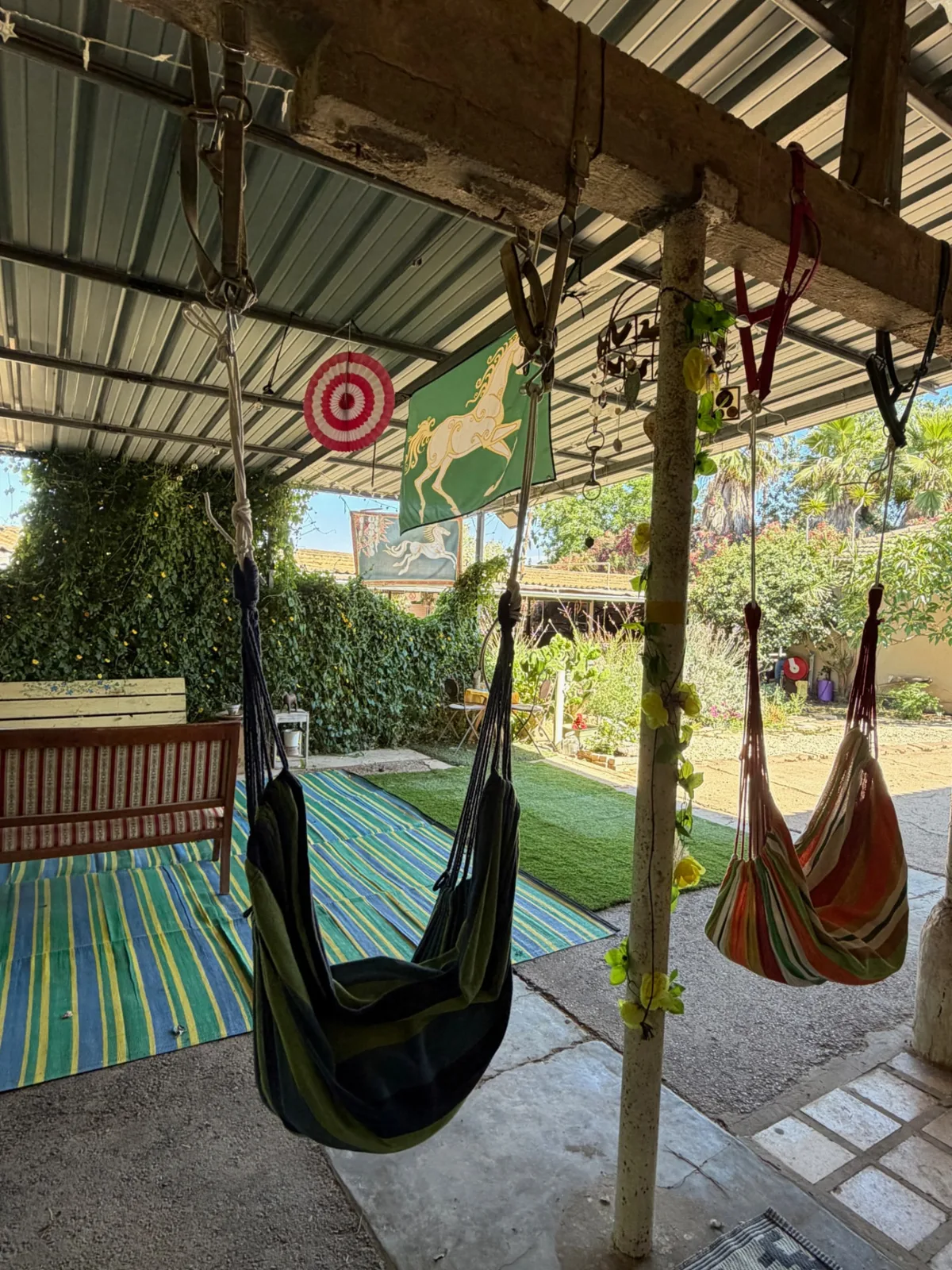 Hammock seating area under a shaded roof